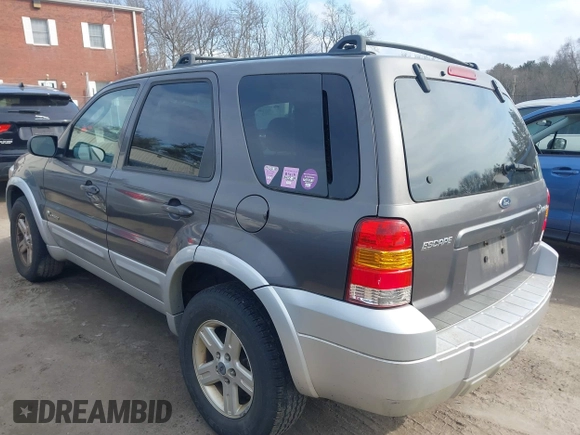 2005 Ford Escape Hybrid with VIN 1FMCU96H55KC23712, listed as a IAAI auction lot 41709080 with 164,281 mi miles and . Bid and sale history available at DreamBid. Image 3.