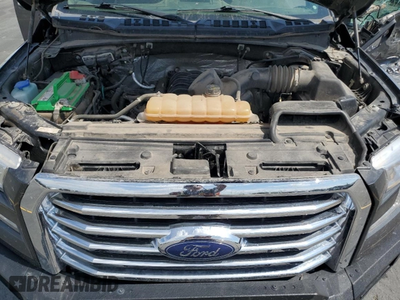 2016 Ford F-150 XLT with VIN 1FTFW1EFXGKF69299, listed as a Copart auction lot 60369425 with 125,205 mi miles and Salvage title. Bid and sale history available at DreamBid. Image 11.