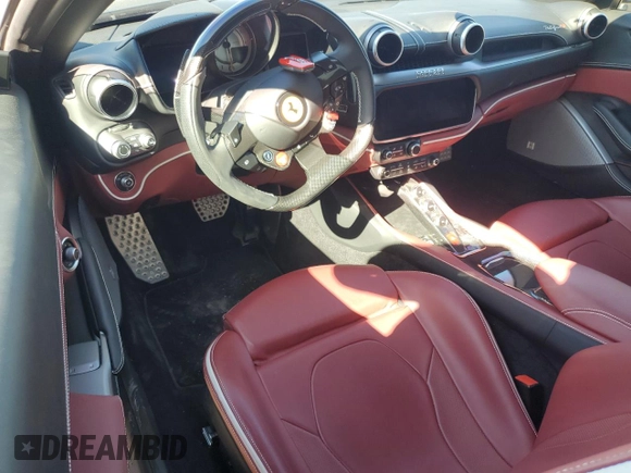 2023 Ferrari Portofino z VIN ZFF02RPA2P0294865, wystawiony jako Copart lot #80473504 z przebiegiem 1 927 mil mil oraz Szkoda całkowita • Salvage title. Historia ofert i sprzedaży dostępna na DreamBid. Obrazek 8.