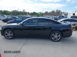 2013 Dodge Charger SXT z VIN 2C3CDXJG2DH528683, wystawiony jako IAAI lot #41644348 z przebiegiem 124 157 mil mil oraz . Historia ofert i sprzedaży dostępna na DreamBid. Obrazek 14.
