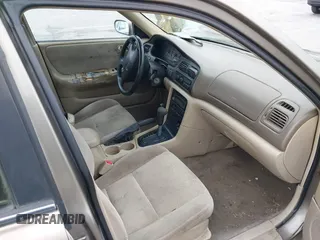 1999 Mazda 626 ES with VIN 1YVGF22C8X5900510, listed as a IAAI auction lot 41479213 with 178,182 mi miles. Bid and sale history available at carsss.com. Image 5.