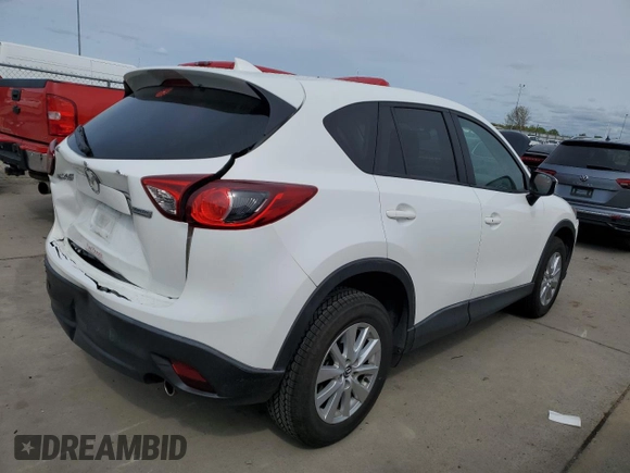 2016 Mazda CX-5 Touring with VIN JM3KE2CYXG0777715, listed as a Copart auction lot 52157005 with 58,585 mi miles and Salvage Title. Bid and sale history available at carsss.com. Image 3.
