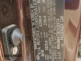 2011 Kia Optima LX z VIN KNAGM4A71B5056974, wystawiony jako Copart lot #54190885 z przebiegiem 53 768 mil mil oraz Szkoda całkowita • Salvage title. Historia ofert i sprzedaży dostępna na DreamBid. Obrazek 12.