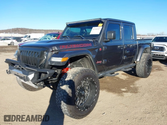 2020 Jeep Gladiator Rubicon with VIN 1C6JJTBG5LL179188, listed as a IAAI auction lot 41316367 with 136,670 mi miles and . Bid and sale history available at DreamBid. Image 2.