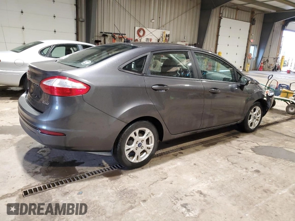 2015 Ford Fiesta SE with VIN 3FADP4BJ5FM123167, listed as a Copart auction lot 52576405 with 104,243 mi miles and Salvage Title. Bid and sale history available at DreamBid. Image 3.