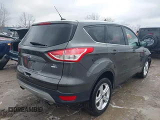 2016 Ford Escape SE with VIN 1FMCU9GXXGUC53589, listed as a IAAI auction lot 42017364 with 89,394 mi miles. Bid and sale history available at carsss.com. Image 4.