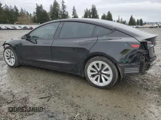 2023 Tesla Model 3 Long Range with VIN 5YJ3E1EB9PF607217, listed as a Copart auction lot 50103645 with 82,198 mi miles and Salvage Title. Bid and sale history available at DreamBid. Image 2.