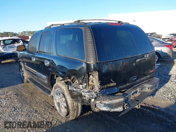 2002 GMC Yukon SLT with VIN 1GKEC13Z42J245768, listed as a IAAI auction lot 41769081 with 389,189 mi miles. Bid and sale history available at carsss.com. Image 6.