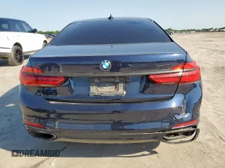 2016 BMW 7 Series 740i z VIN WBA7E2C55GG504304, wystawiony jako Copart lot #59251345 z przebiegiem 115 942 mil mil oraz Czysty tytuł • Clean title. Historia ofert i sprzedaży dostępna na DreamBid. Obrazek 6.