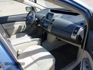 2007 Toyota Prius with VIN JTDKB20U577628705, listed as a IAAI auction lot 42135345 with 213,924 mi miles. Bid and sale history available at carsss.com. Image 5.