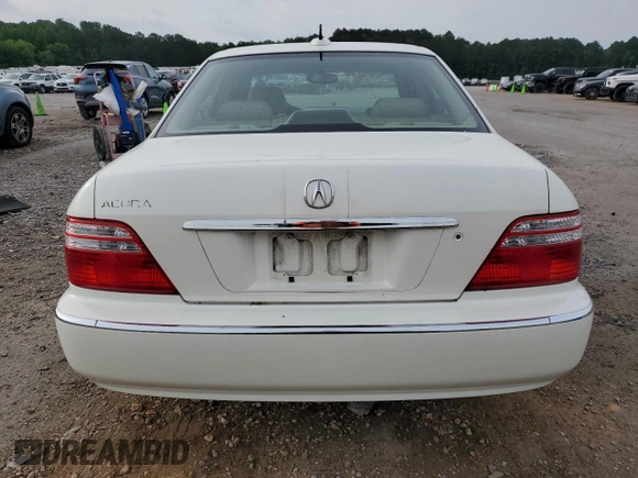 2004 Acura RL w/Navigation System z VIN JH4KA96674C007925, wystawiony jako Copart lot #56732645 z przebiegiem 188 312 mil mil oraz Szkoda całkowita • Salvage title. Historia ofert i sprzedaży dostępna na DreamBid. Obrazek 6.