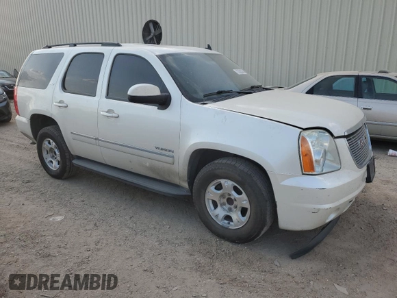 2012 GMC Yukon SLT with VIN 1GKS1CE03CR287810, listed as a Copart auction lot 73743304 with 206,122 mi miles and Salvage Title. Bid and sale history available at carsss.com. Image 4.