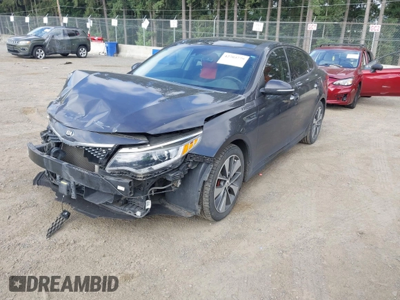 2016 Kia Optima SX Turbo z VIN 5XXGW4L28GG010897, wystawiony jako IAAI lot #42703779 z przebiegiem 121 918 mil mil oraz . Historia ofert i sprzedaży dostępna na DreamBid. Obrazek 19.
