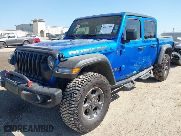 2023 Jeep Gladiator Rubicon with VIN 1C6JJTBG3PL581023, listed as a IAAI auction lot 41963931 with 15,023 mi miles and . Bid and sale history available at DreamBid. Image 18.