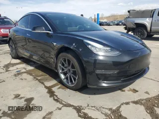 2020 Tesla Model 3 Long Range with VIN 5YJ3E1EB4LF599909, listed as a Copart auction lot 52435425 with 118,574 mi miles and Salvage Title. Bid and sale history available at DreamBid. Image 4.