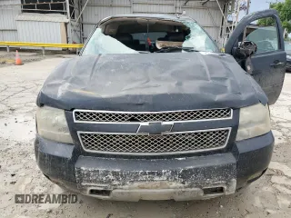 2011 Chevrolet Suburban LT with VIN 1GNSKJE38BR240348, listed as a Copart auction lot 54163335 with 263,030 mi miles and Salvage Title. Bid and sale history available at carsss.com. Image 11.