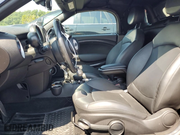2013 MINI Roadster S z VIN WMWSY3C58DT594039, wystawiony jako Copart lot #65833804 z przebiegiem Nie podano mil oraz Szkody całkowita. Historia ofert i sprzedaży dostępna na DreamBid. Obrazek 7.