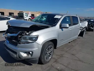 2020 Chevrolet Colorado 2WD Work Truck with VIN 1GCGSBEN0L1209889, listed as a IAAI auction lot 40390370 with 67,417 mi miles and . Bid and sale history available at DreamBid. Image 2.