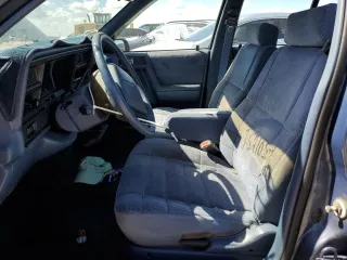 1993 Dodge Spirit z VIN 1B3XA46K0PF638477, wystawiony jako Copart lot #75710534 z przebiegiem 50 637 mil mil oraz Szkody całkowita. Historia ofert i sprzedaży dostępna na DreamBid. Obrazek 7.