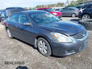 2010 Nissan Altima 2.5 S with VIN 1N4AL2AP9AN471027, listed as a IAAI auction lot 42141975 with 999,999 mi miles. Bid and sale history available at carsss.com. Image 1.