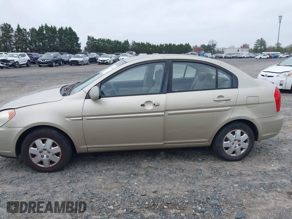2006 Hyundai Accent GLS z VIN KMHCN46C66U058232, wystawiony jako IAAI lot #41899629 z przebiegiem 182 669 mil mil oraz . Historia ofert i sprzedaży dostępna na DreamBid. Obrazek 14.