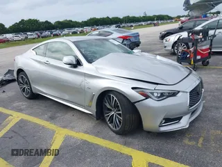 2020 Infiniti Q60 Luxe with VIN JN1EV7EK5LM340383, listed as a IAAI auction lot 40920550 with 59,690 mi miles and . Bid and sale history available at carsss.com. Image 1.