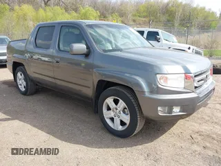 2009 Honda Ridgeline RTL with VIN 5FPYK16549B104955, listed as a IAAI auction lot 42148524 with 99,482 mi miles and . Bid and sale history available at DreamBid. Image 1.