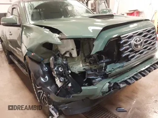 2022 Toyota Tacoma SR z VIN 3TYSZ5AN0NT094346, wystawiony jako IAAI lot #41715982 z przebiegiem 58 463 mil mil oraz . Historia ofert i sprzedaży dostępna na DreamBid. Obrazek 6.