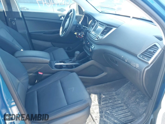 2018 Hyundai Tucson SE z VIN KM8J2CA40JU792495, wystawiony jako IAAI lot #42144647 z przebiegiem 62 769 mil mil oraz . Historia ofert i sprzedaży dostępna na DreamBid. Obrazek 5.