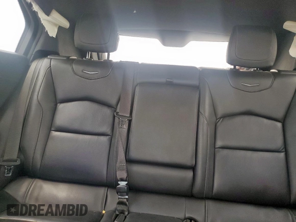 2021 Cadillac XT4 FWD Premium Luxury z VIN 1GYFZCR42MF004233, wystawiony jako Copart lot #57229385 z przebiegiem 98 387 mil mil oraz Szkody całkowita. Historia ofert i sprzedaży dostępna na DreamBid. Obrazek 10.