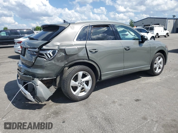 2021 Audi Q3 Premium with VIN WA1AUCF37M1067054, listed as a Copart auction lot 57299815 with 67,334 mi miles and Salvage title. Bid and sale history available at DreamBid. Image 3.