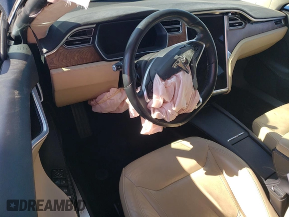 2016 Tesla Model S 90D with VIN 5YJSA1E26GF168260, listed as a Copart auction lot 48703154 with 90,567 mi miles and Salvage Title. Bid and sale history available at DreamBid. Image 8.