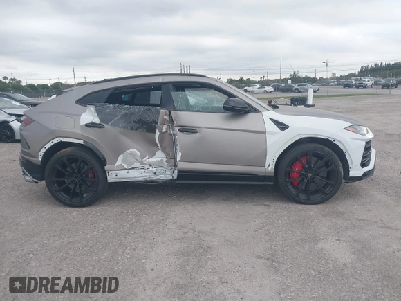 2019 Lamborghini Urus z VIN ZPBUA1ZL6KLA06025, wystawiony jako IAAI lot #41582035 z przebiegiem 71 842 mil mil oraz . Historia ofert i sprzedaży dostępna na DreamBid. Obrazek 14.