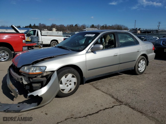 1999 Honda Accord Sdn LX with VIN 1HGCG1646XA013608, listed as a Copart auction lot 42612705 with 160,517 mi miles and Salvage Title. Bid and sale history available at carsss.com. Image 1.