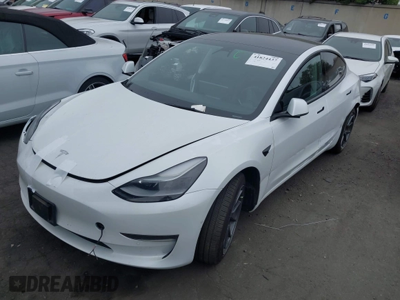 2022 Tesla Model 3 with VIN 5YJ3E1EA7NF108758, listed as a IAAI auction lot 41824437 with Not Provided miles. Bid and sale history available at carsss.com. Image 2.