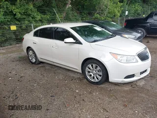 2013 Buick LaCrosse z VIN 1G4GA5ER9DF185664, wystawiony jako IAAI lot #42745181 z przebiegiem 194 484 mil mil oraz . Historia ofert i sprzedaży dostępna na DreamBid. Obrazek 1.