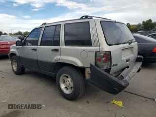 1995 Jeep Grand Cherokee Laredo with VIN 1J4GZ58S2SC703196, listed as a Copart auction lot 68571944 with 264,876 mi miles and Clean Title. Bid and sale history available at carsss.com. Image 2.