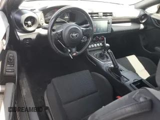 2023 Toyota 86 with VIN JF1ZNBB17P9750114, listed as a Copart auction lot 56693485 with 22,669 mi miles and Salvage title. Bid and sale history available at DreamBid. Image 8.