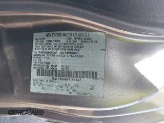2004 Ford Mustang Standard z VIN 1FAFP40684F194867, wystawiony jako IAAI lot #39963442 z przebiegiem Nie podano mil oraz . Historia ofert i sprzedaży dostępna na DreamBid. Obrazek 9.