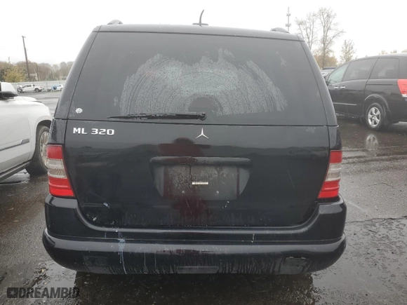 2001 Mercedes-Benz M-Class with VIN 4JGAB54E51A273024, listed as a Copart auction lot 80327264 with 211,120 mi miles and Salvage Title. Bid and sale history available at carsss.com. Image 6.