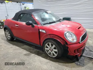 2012 MINI Roadster S with VIN WMWSY3C58CT144227, listed as a Copart auction lot 47918135 with 133,430 mi miles and Salvage Title. Bid and sale history available at DreamBid. Image 4.