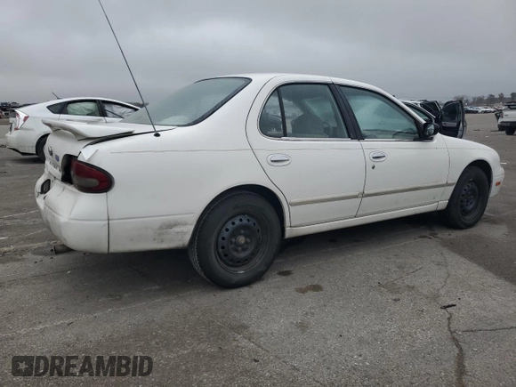 1997 Nissan Altima XE with VIN 1N4BU31D4VC232757, listed as a Copart auction lot 79102784 with 211,466 mi miles and Salvage Title. Bid and sale history available at carsss.com. Image 3.