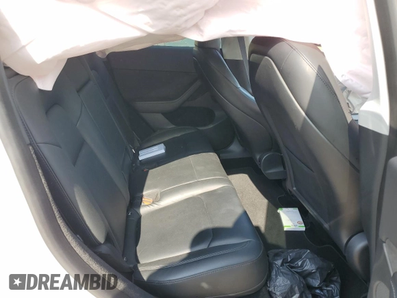 2023 Tesla Model Y Long Range with VIN 7SAYGDEE6PA053274, listed as a Copart auction lot 52865175 with Not Provided miles and Salvage Title. Bid and sale history available at DreamBid. Image 10.