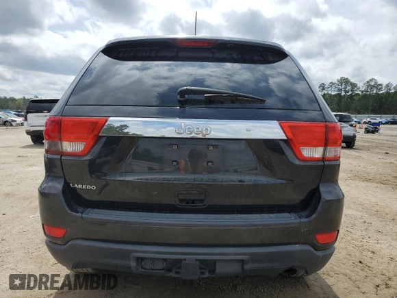 2011 Jeep Grand Cherokee Laredo with VIN 1J4RS4GG4BC537459, listed as a Copart auction lot 50920965 with 112,810 mi miles and Salvage Title. Bid and sale history available at DreamBid. Image 6.