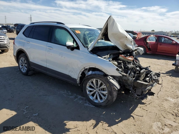 2019 Volkswagen Tiguan S with VIN 3VV1B7AX2KM009383, listed as a Copart auction lot 43583725 with 0 mi miles and Salvage Title. Bid and sale history available at carsss.com. Image 4.