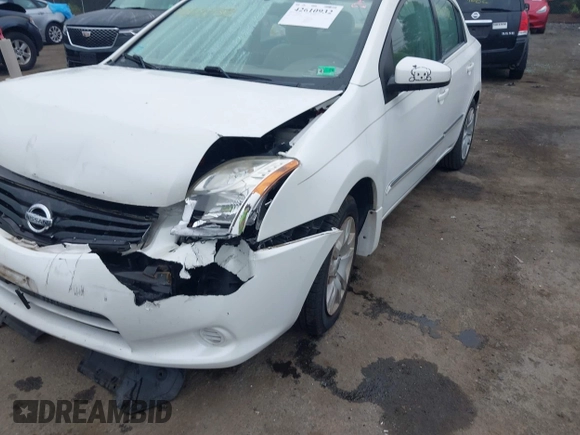 2012 Nissan Sentra S z VIN 3N1AB6APXCL636612, wystawiony jako IAAI lot #42610932 z przebiegiem 150 605 mil mil oraz . Historia ofert i sprzedaży dostępna na DreamBid. Obrazek 6.