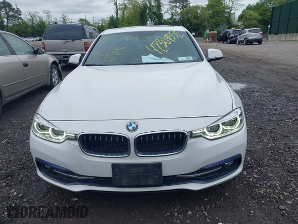 2018 BMW 3 Series 330i xDrive with VIN WBA8D9C52JEM32318, listed as a IAAI auction lot 42309352 with 61,828 mi miles and . Bid and sale history available at DreamBid. Image 12.
