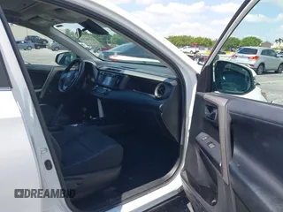 2018 Toyota RAV4 XLE with VIN 2T3WFREV9JW490324, listed as a IAAI auction lot 42298261 with 167,727 mi miles and . Bid and sale history available at DreamBid. Image 5.