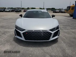 2020 Audi R8 z VIN WUAKBAFX9L7900195, wystawiony jako Copart lot #59888215 z przebiegiem 16 548 mil mil oraz Czysty tytuł • Clean title. Historia ofert i sprzedaży dostępna na DreamBid. Obrazek 5.