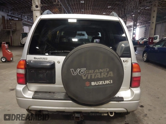 2002 Suzuki Grand Vitara JLX z VIN JS3TD62V324161291, wystawiony jako IAAI lot #41577344 z przebiegiem 164 658 mil mil oraz . Historia ofert i sprzedaży dostępna na DreamBid. Obrazek 16.
